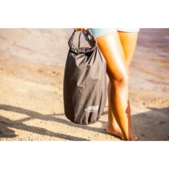 Exodry LT Dry Bag 13 Exodry LT Dry Bag -Paddle Board Shop ExodryLTBlackDryBagLifestyle2 PelicanAccessories